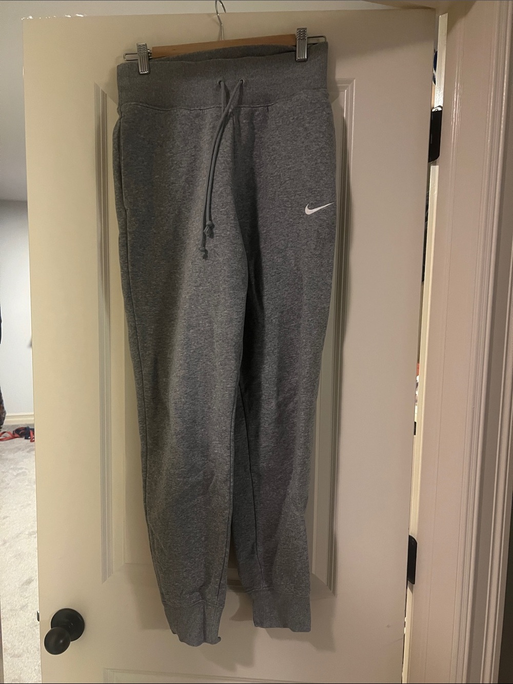 Nike Gray women’s Fleece Joggers with White Swoosh